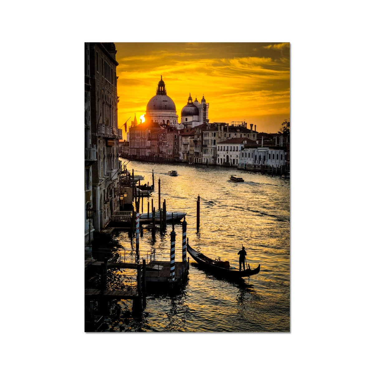 Golden sunset over Venice canal with gondola silhouette, Basilica view