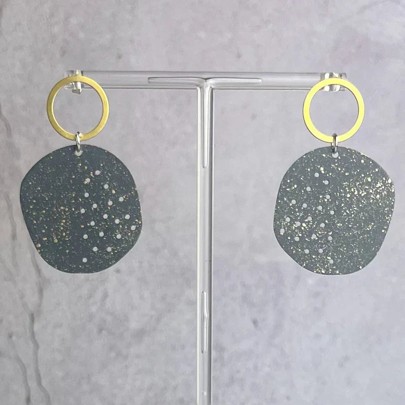 Dark gray speckled disc Teide Cesar earrings with gold hoops by Lindsay Mcdowall Jewellery