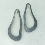 Teide Dali black teardrop metal earrings textured surface