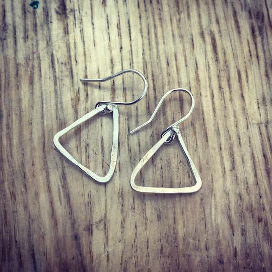Silver triangular hoop earrings by Genna Miller Jewellery