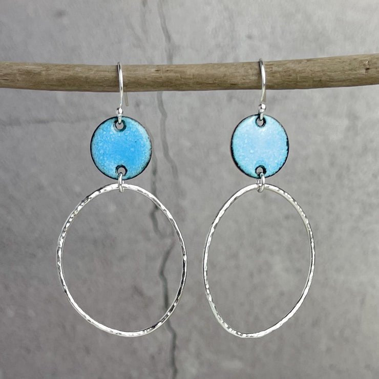 Blue enamel disc earrings with hammered silver hoops, back view