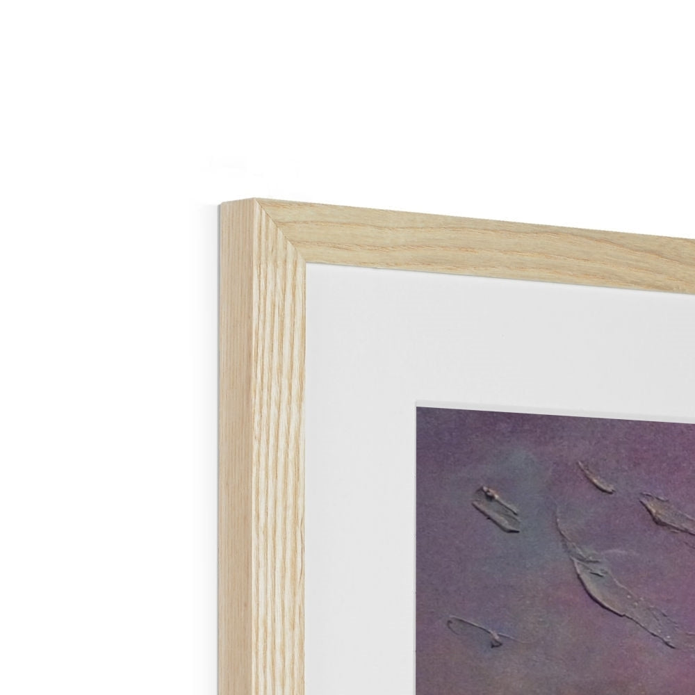 Framed abstract artwork with textured purple and pink hues in light wood frame and white matting