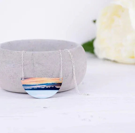 Western Isles Necklace by Cath Waters: half-moon sunset landscape pendant on silver chain