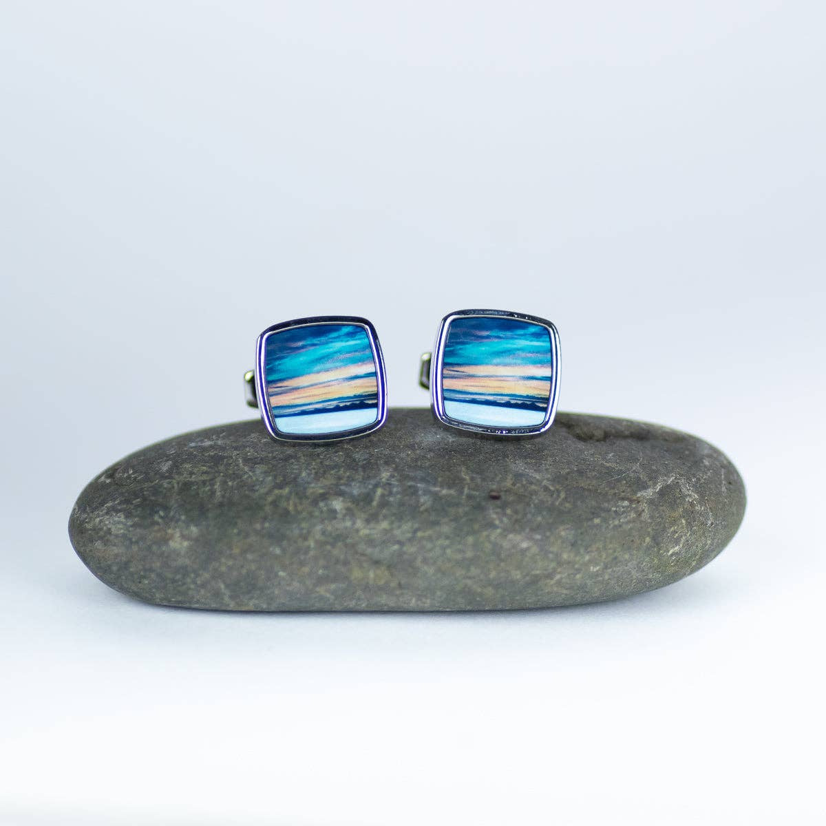 Square cufflinks with blue and gold ocean sunset from Skye by Cath Waters