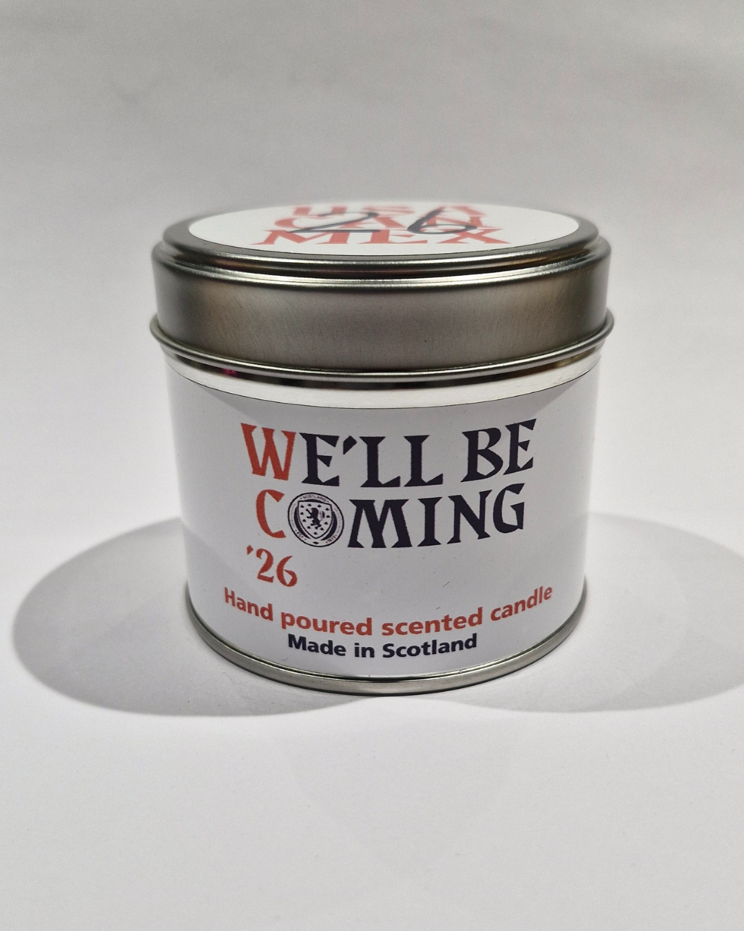 Silver tin official Scotland national football team travel candle with white label and red black text hand poured in Scotland