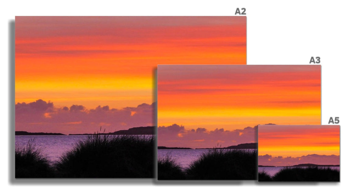 Isle of Gigha post sunset fine art print showing vibrant orange and yellow sunset on three a-series paper sizes