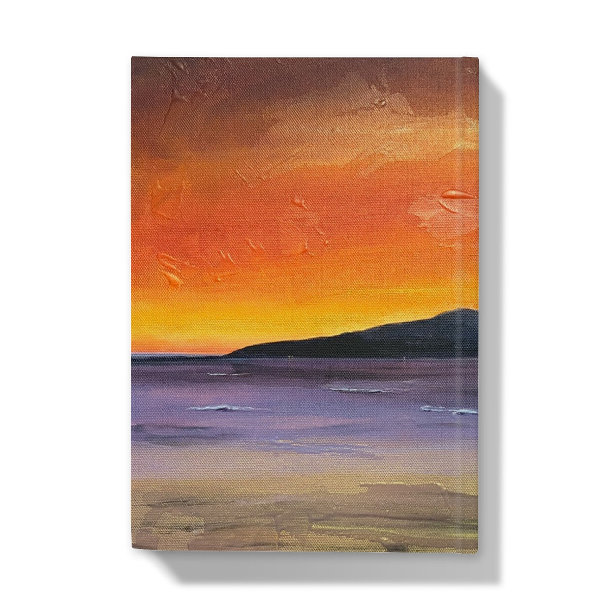 Arran embers hardback journal with a textured impressionistic sunset canvas print in warm orange yellow and purple tones