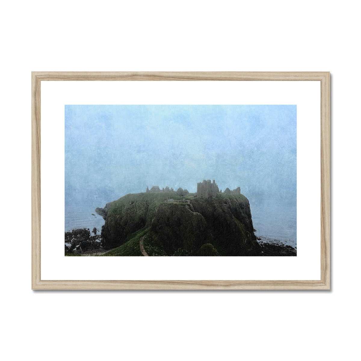 Dunnottar Castle Mist framed print with misty blue sky and green hillside