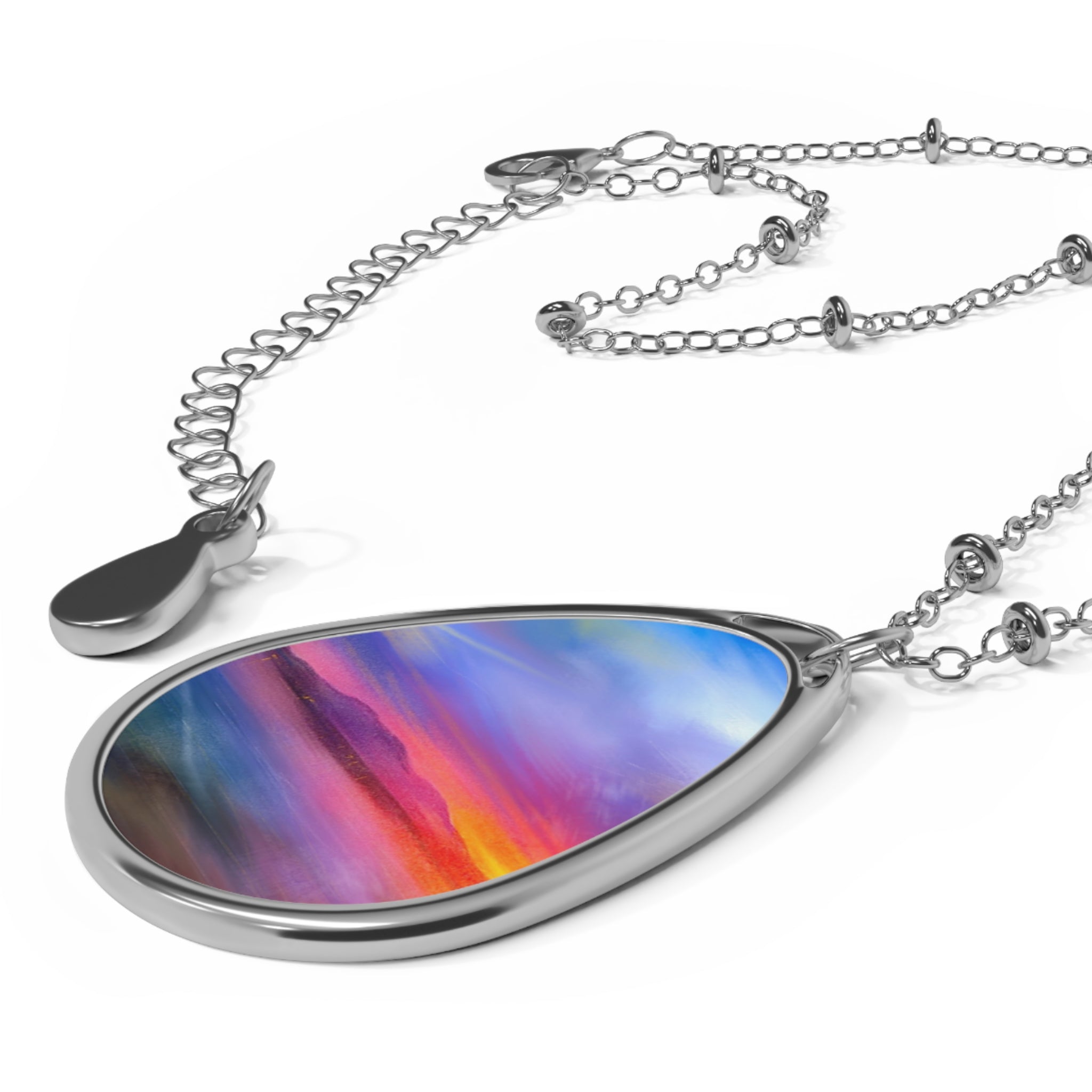 Silver Arran Sunset teardrop necklace with colorful abstract design
