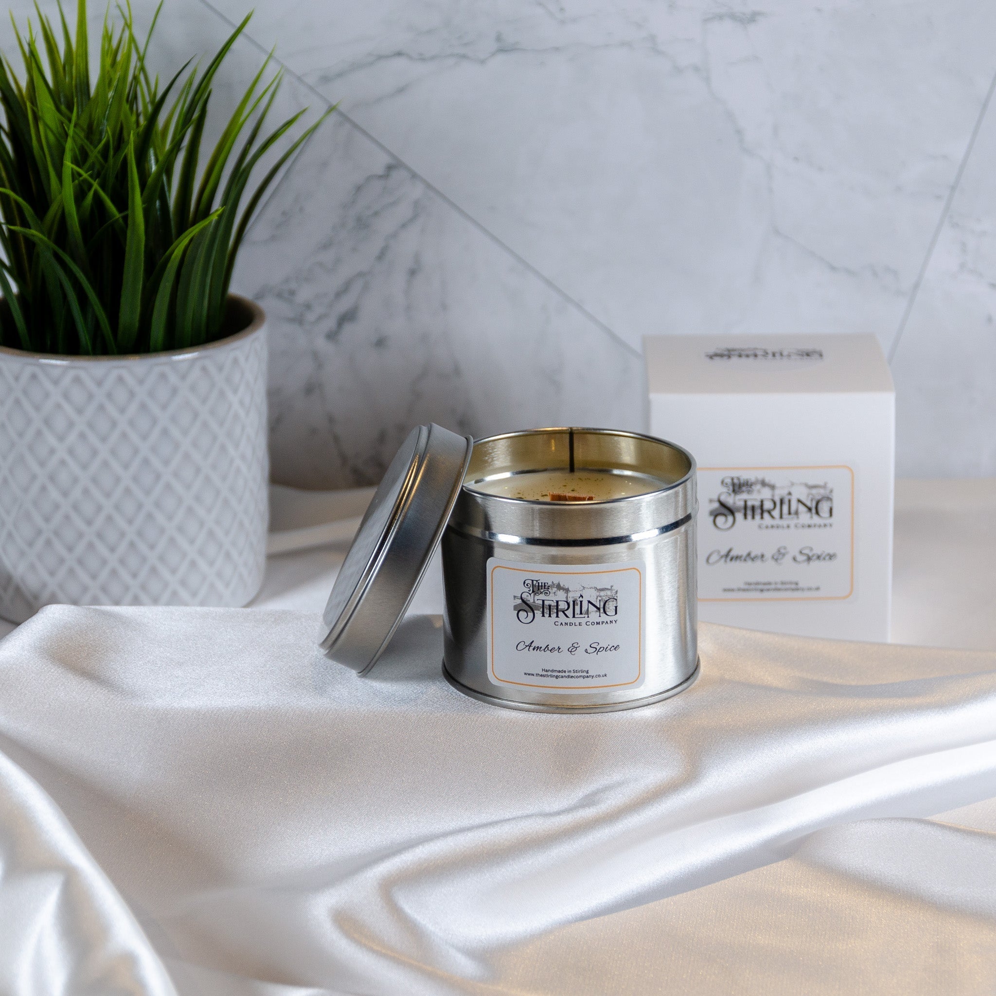 Amber & Spice travel tin candle by Sirling Candle Company with wooden wick