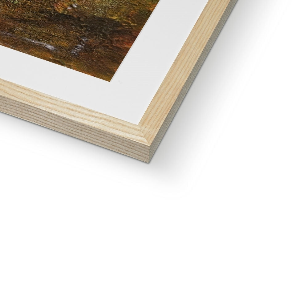 Wooden frame with white mat and brown Approaching The Cobbler artwork