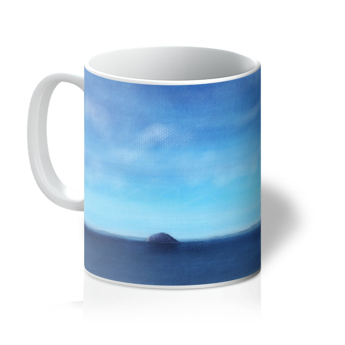 Arran and Ailsa Craig ceramic mug with blue and white ocean scene design