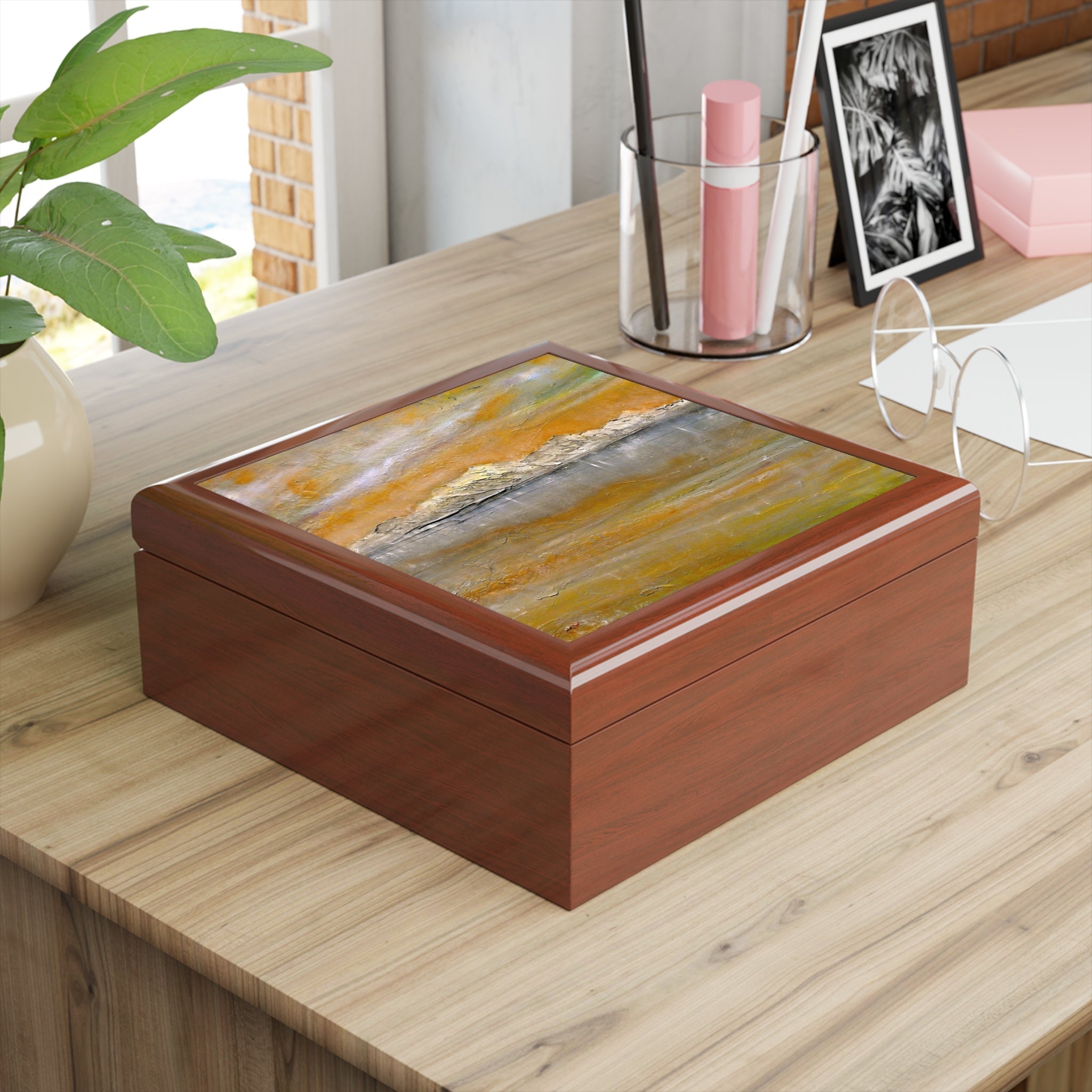 Arran Snow jewelry box with swirling gold, orange, gray lid
