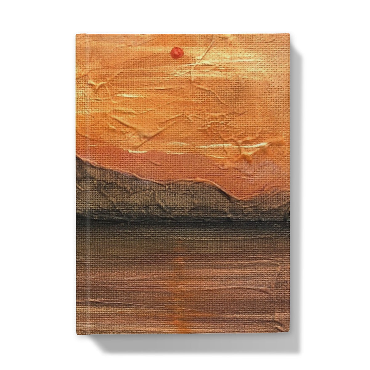 Arran Summer Nights journal with painted sunset over silhouetted mountains