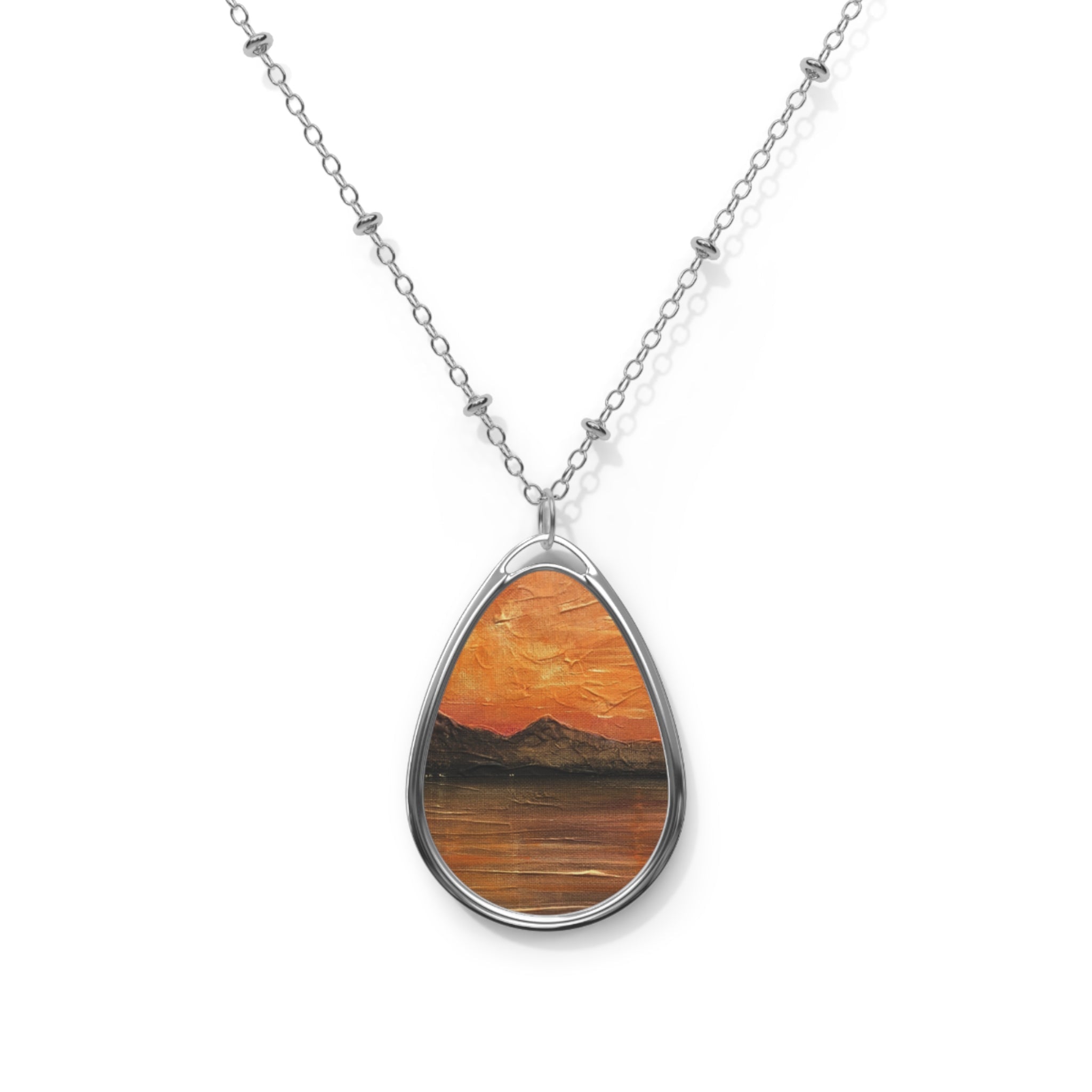 Arran Summer Nights silver teardrop necklace with painted sunset over mountains
