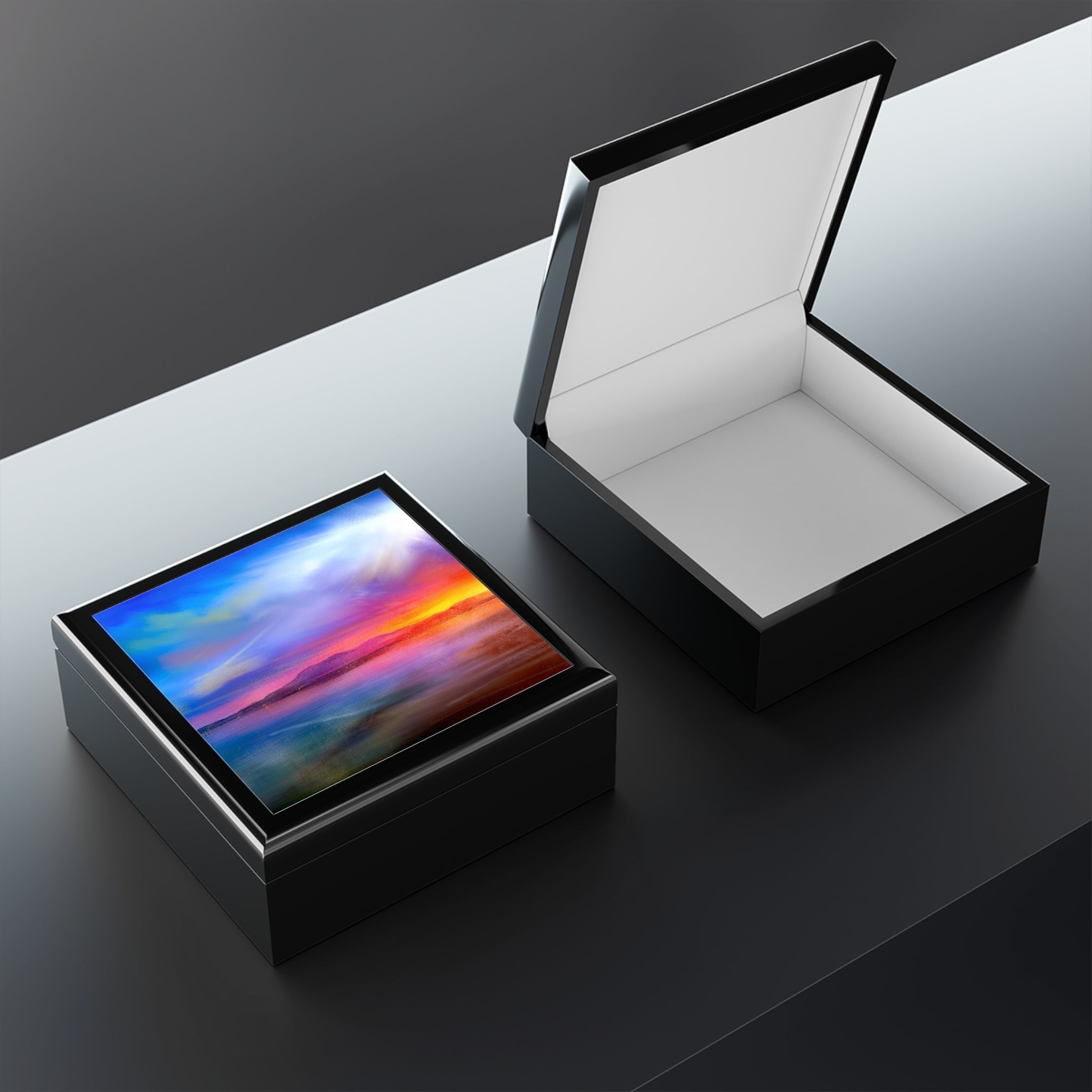 Black leather Arran Sunset art jewellery box with colorful screen on lid in Scotland