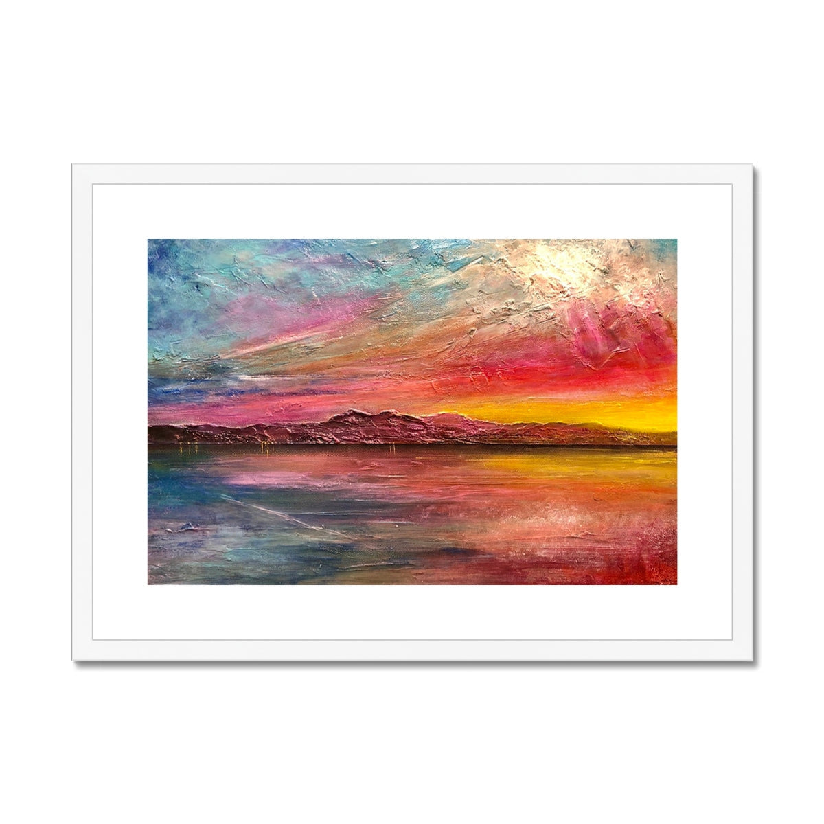 Arran Sunset II vibrant abstract print in white frame, pink orange yellow sky over water mountains