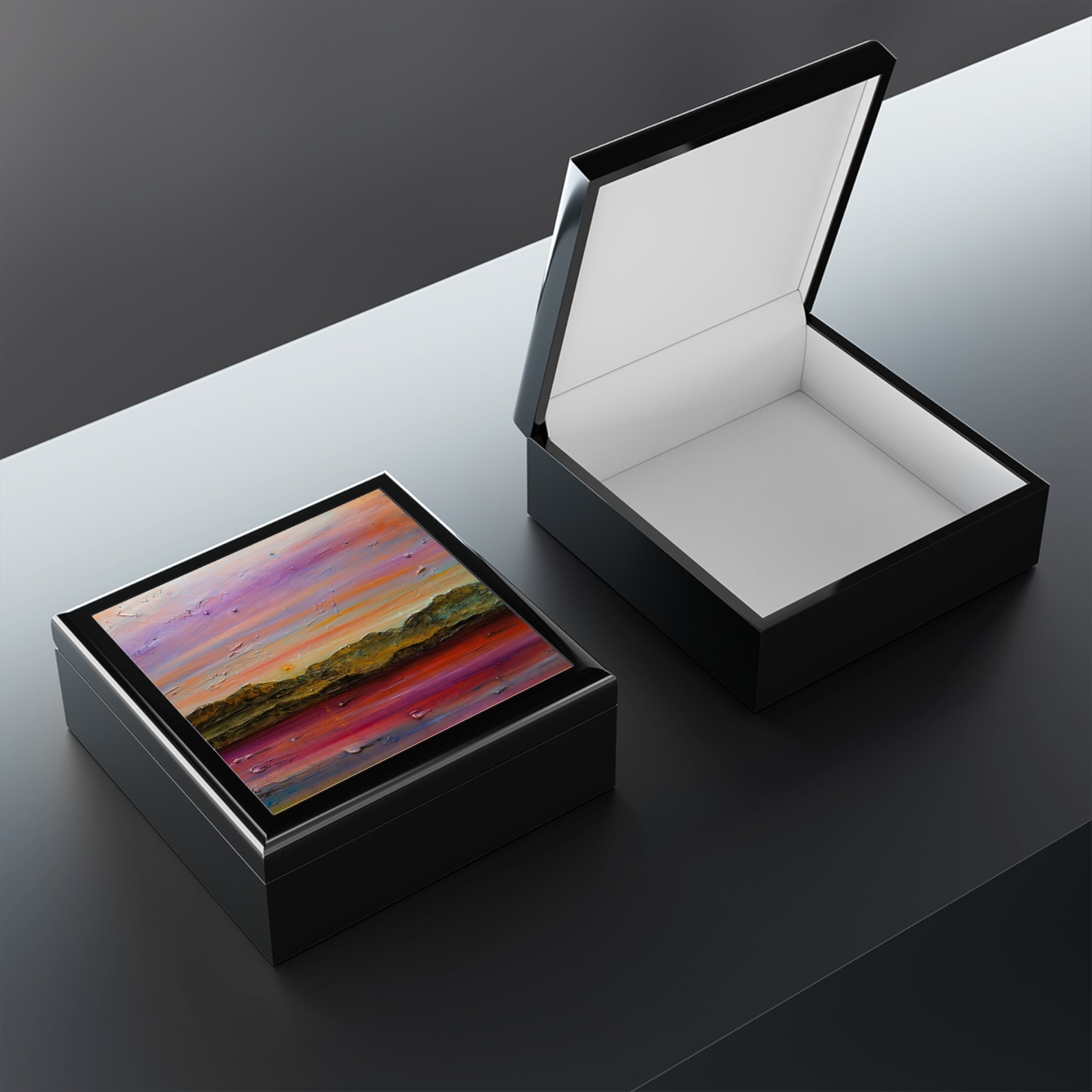 Arran Winter Dusk black square jewellery box with vibrant abstract lid