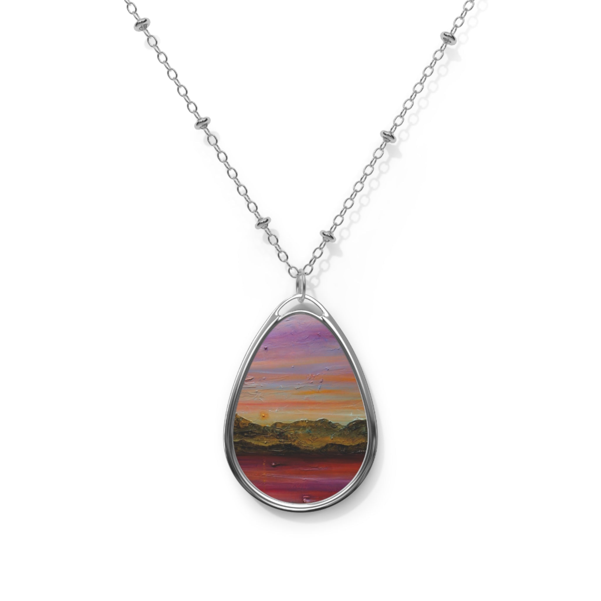 Arran Winter Dusk silver teardrop necklace with sunset landscape