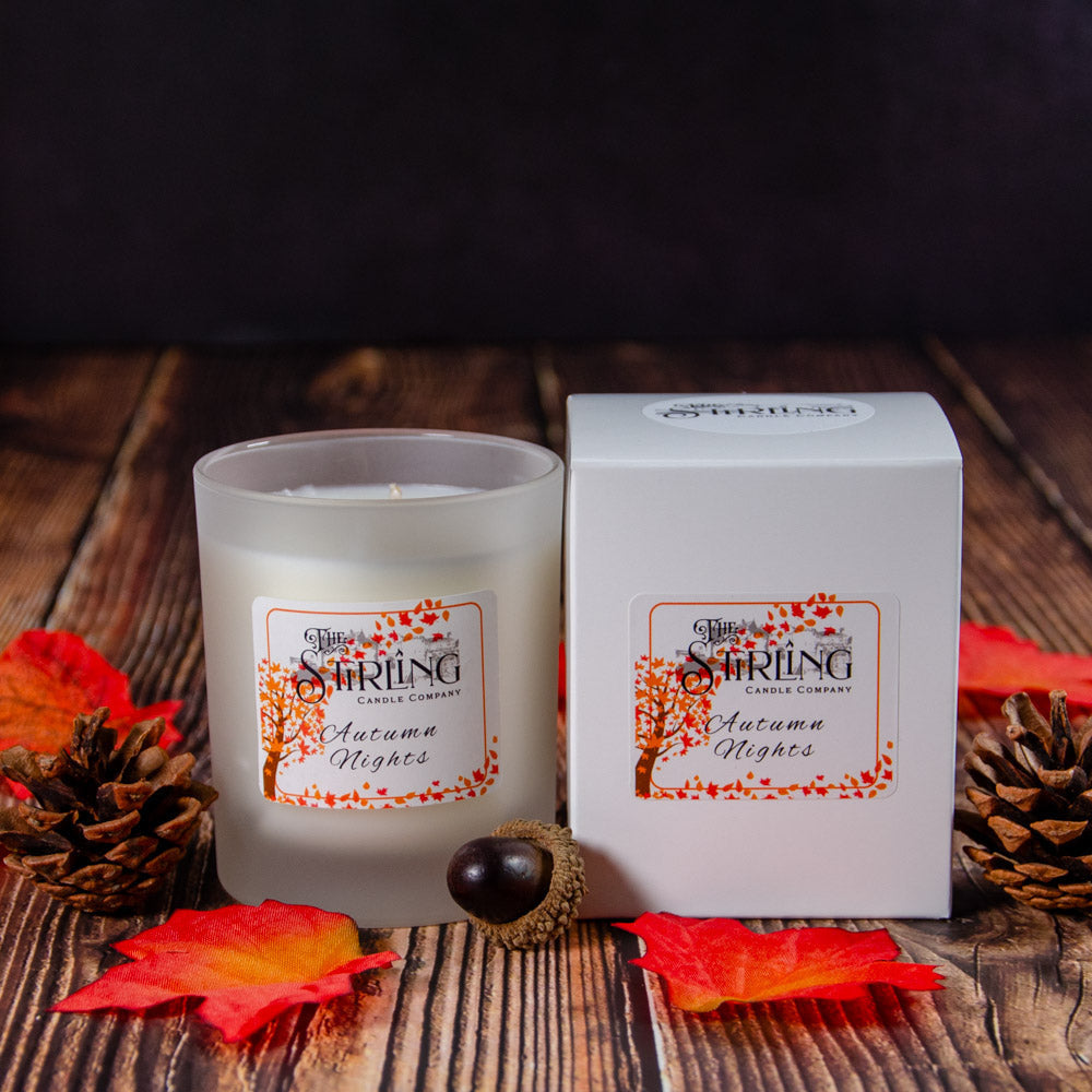 Autumn Nights Medium Candle in frosted glass jar with orange and white label