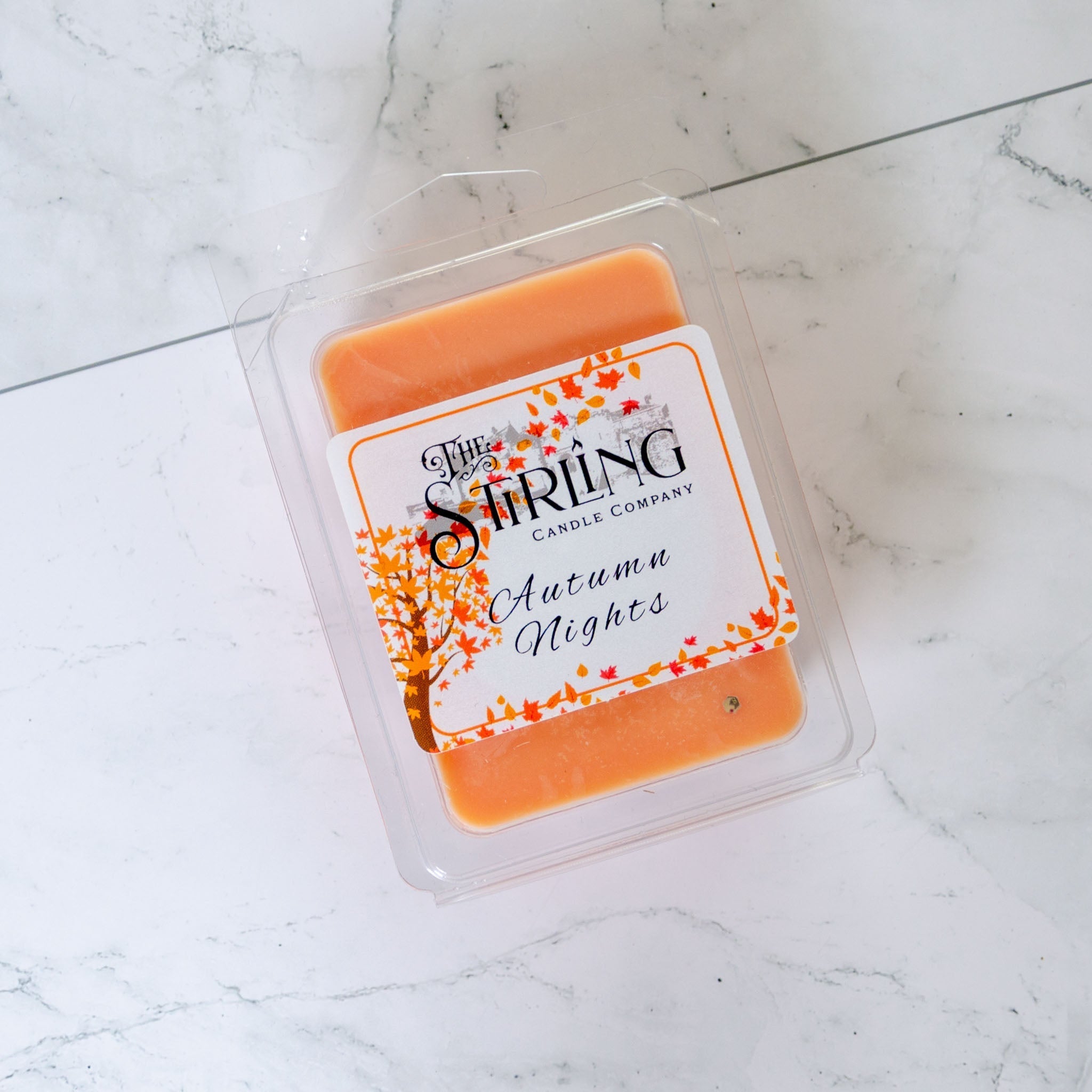 Autumn Nights orange wax melt clamshell from Stirling Candle Company