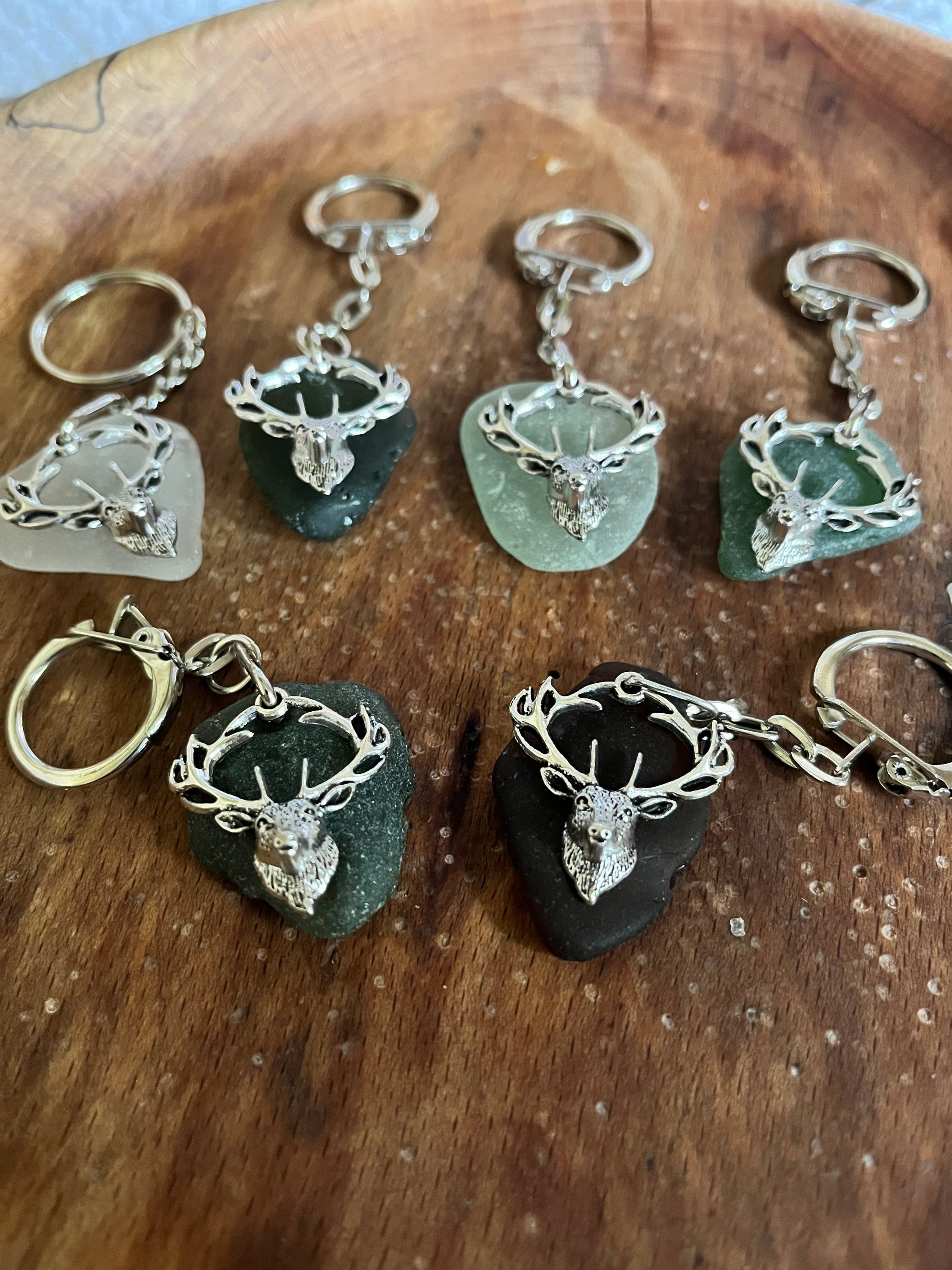 Silver deer head keychain on polished stone base, Stag Seaglass Keyrings