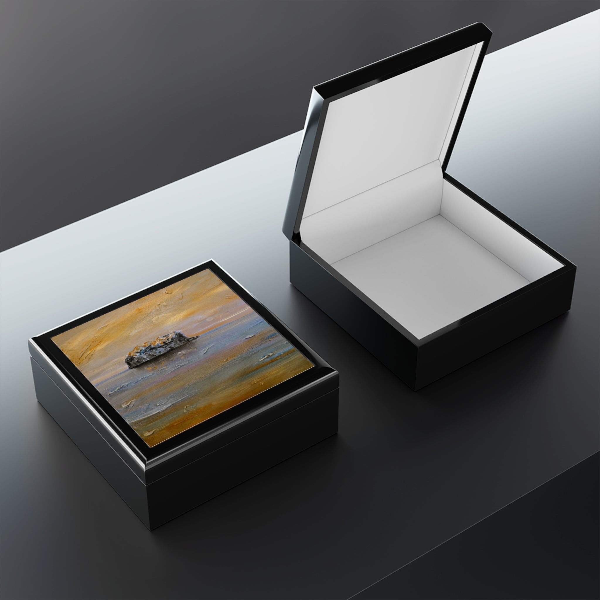 Glossy black Bass Rock Dawn jewelry box with orange-gray rock lid art