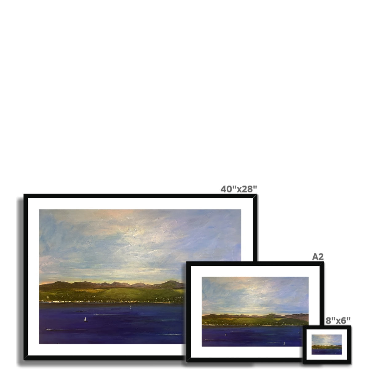 Set of three framed landscape paintings of varying sizes displayed with The Biggie Framed & Mounted Print