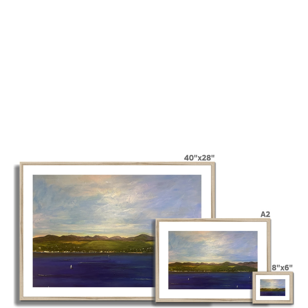 Set of three framed landscape paintings of varying sizes displayed with The Biggie Framed & Mounted Print