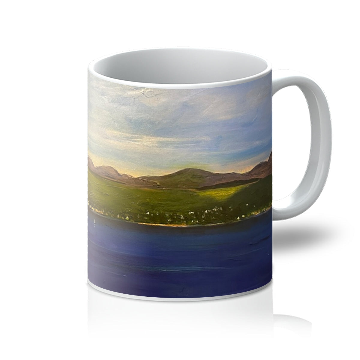 White ceramic The Biggie Mug with a painted landscape scene for coffee or tea