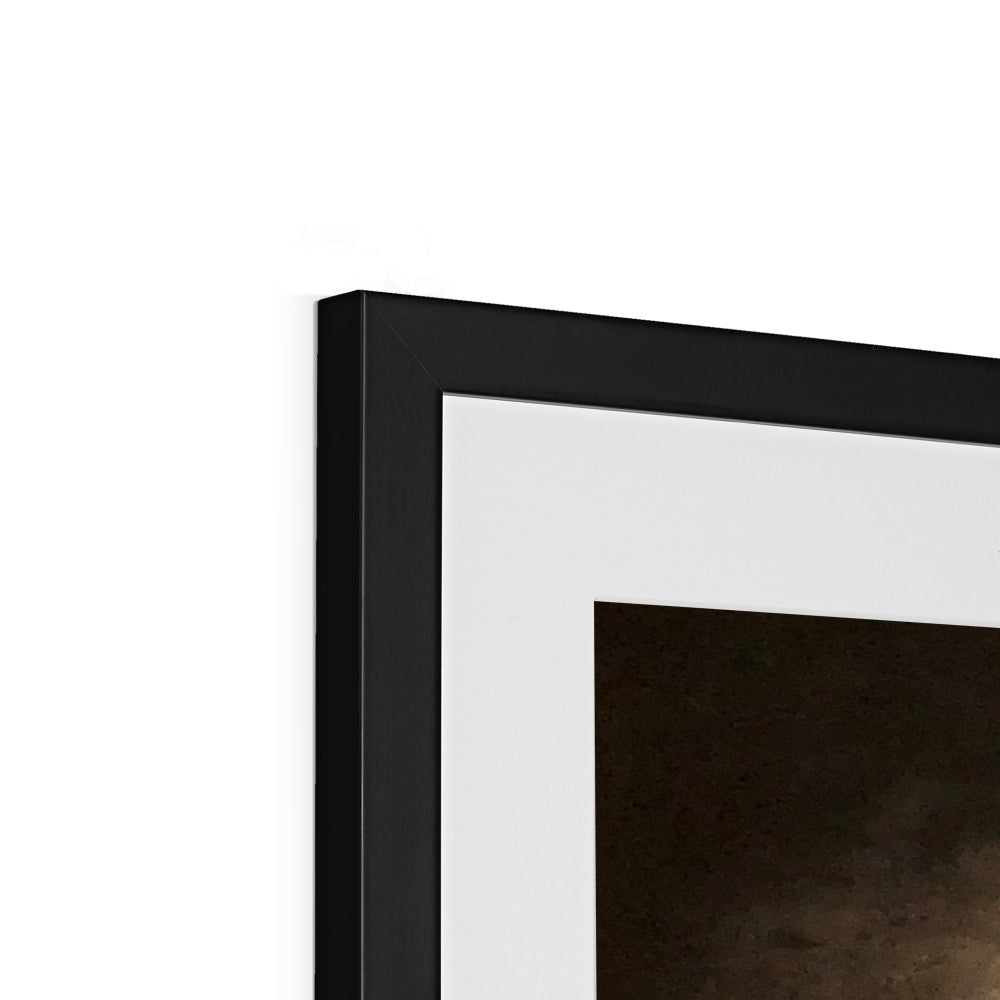Black picture frame with white mat surrounding the Brooding Castle Stalker print