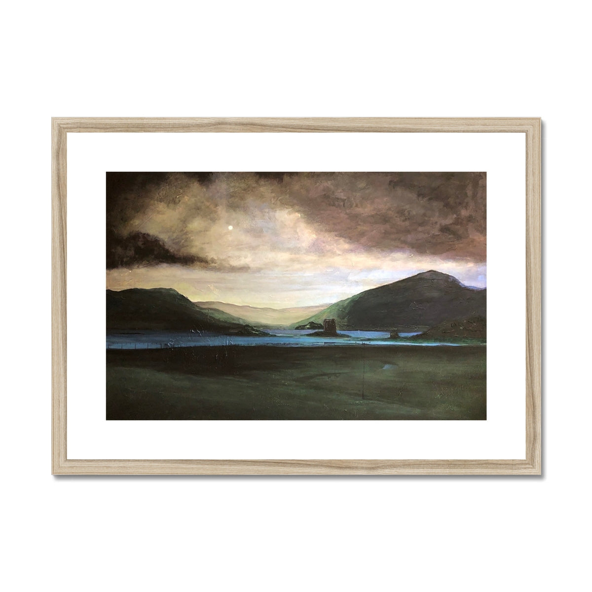 Framed landscape painting of cloudy sky over mountains, lake, and Castle Stalker