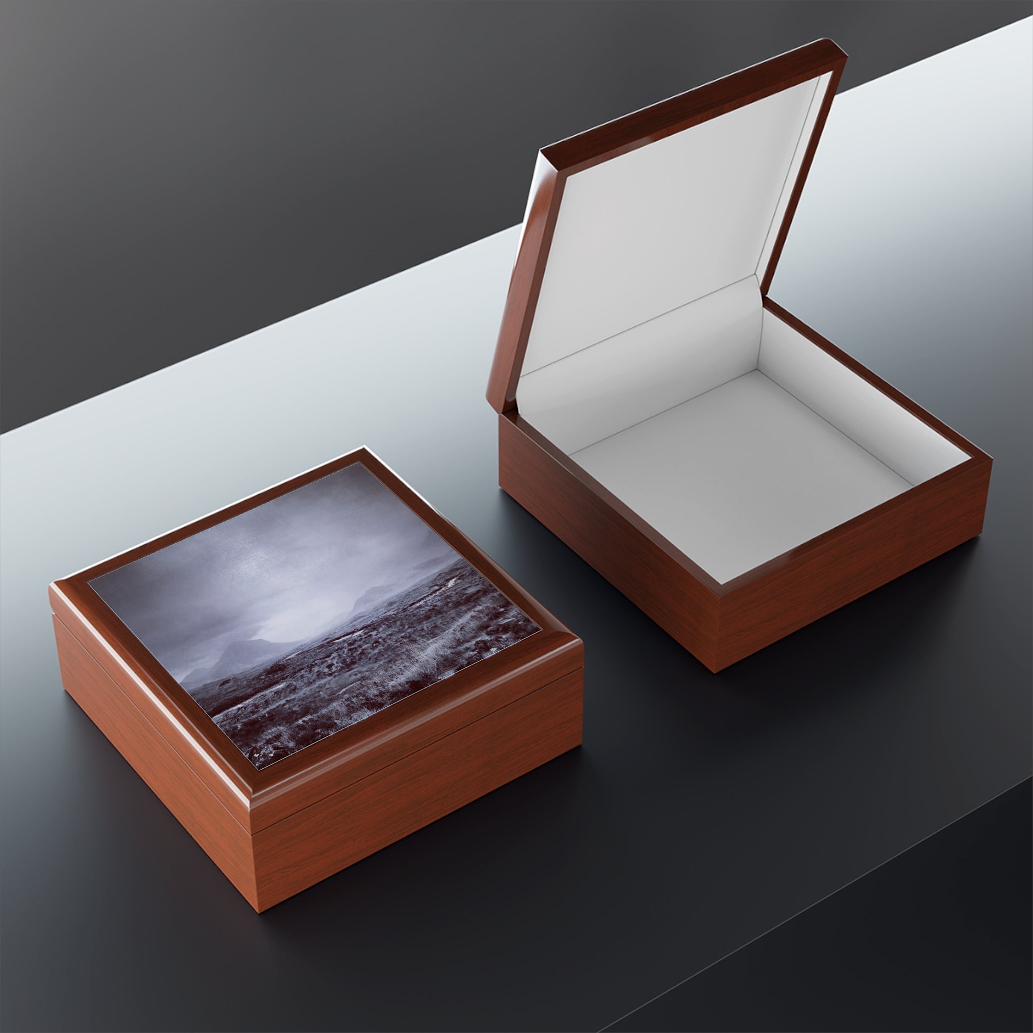 Brown wooden jewelry box with clear lid displaying The Brooding Cuillin grayscale landscape