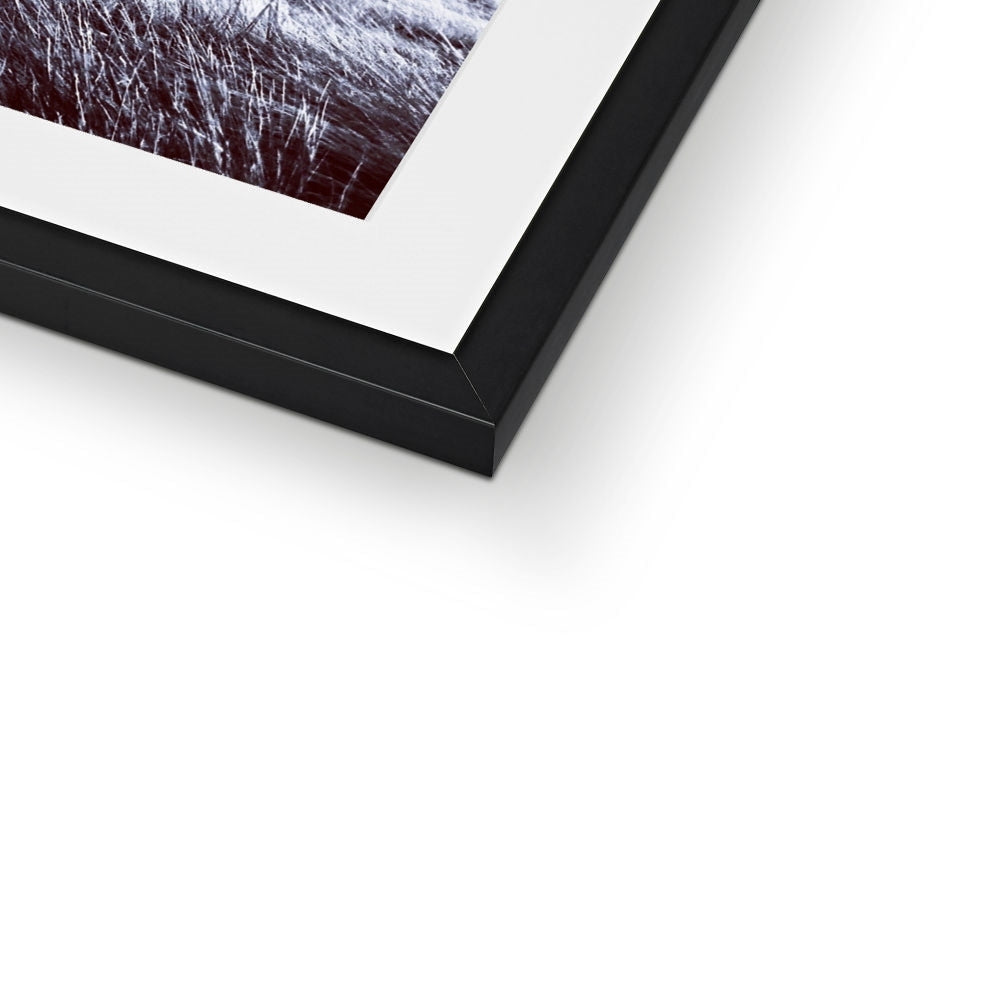 Black matte frame with white mat and brooding glen Varagil art print