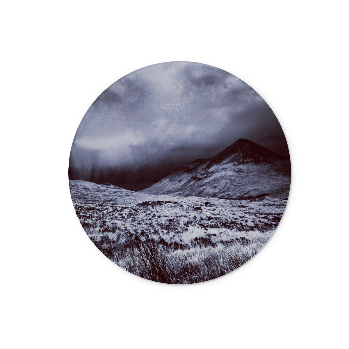 Black and white mountain landscape circular sticker on A Brooding Glen Varagil Glass Chopping Board