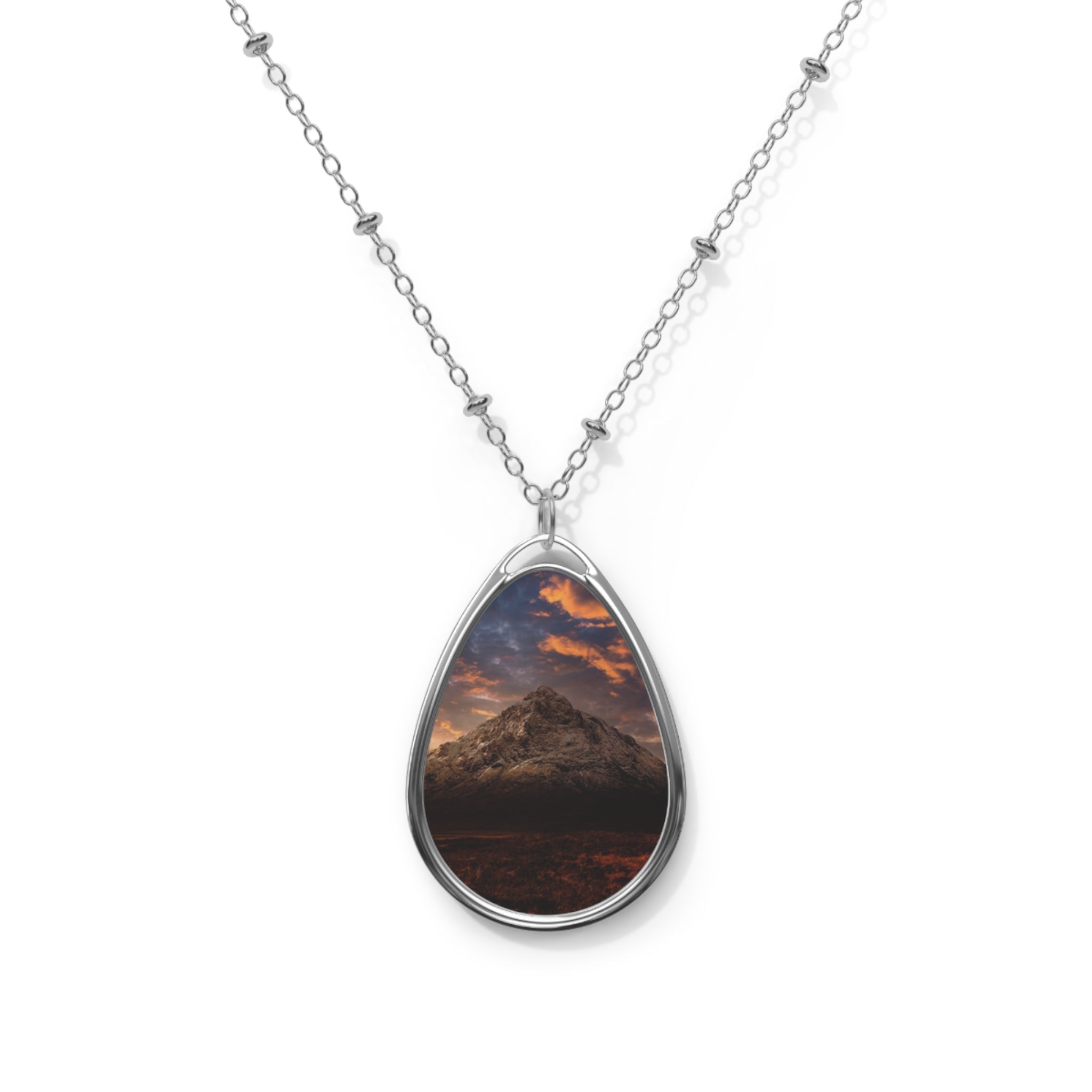 Silver chain necklace with oval pendant of Mountain Landscape under colorful sky