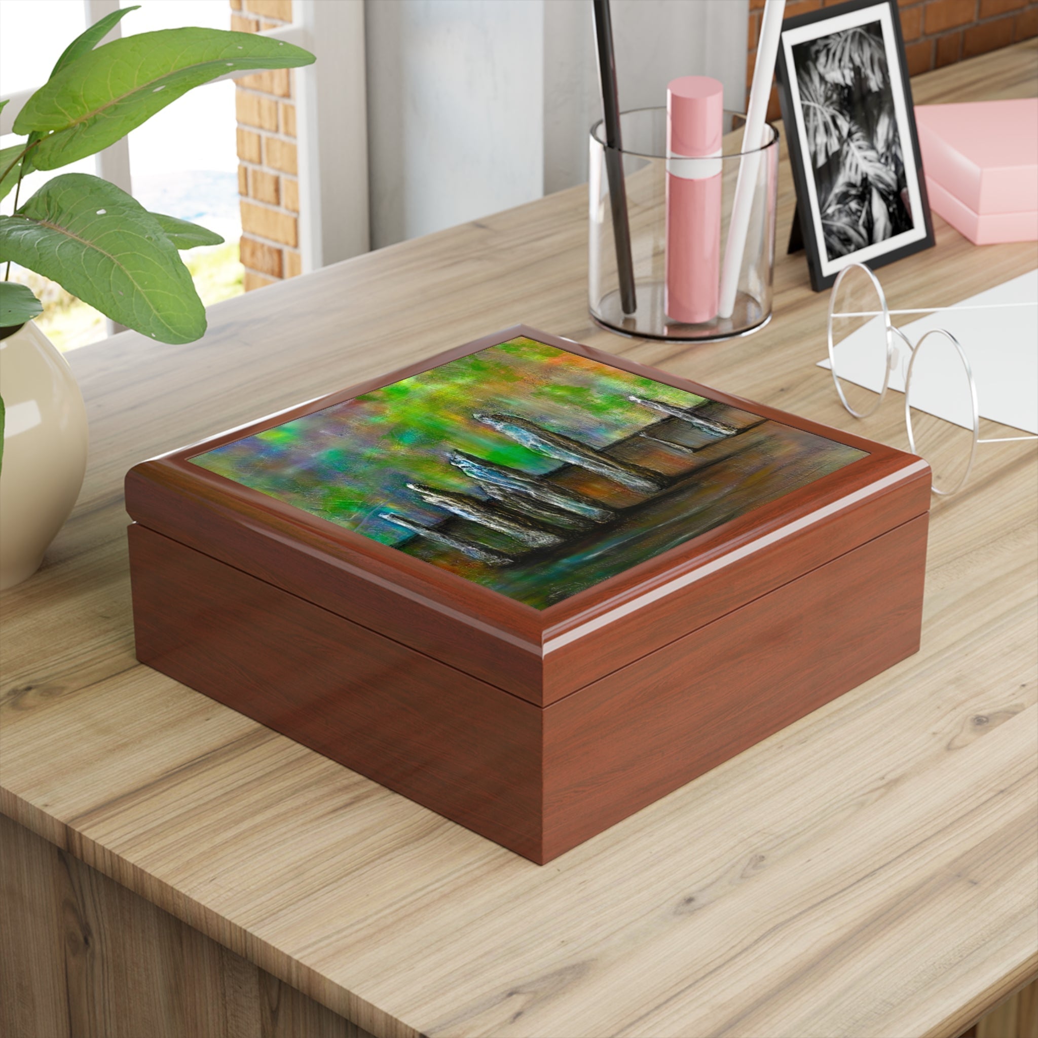 Brown wooden jewelry box with abstract colorful lid from Callanish Northern Lights collection