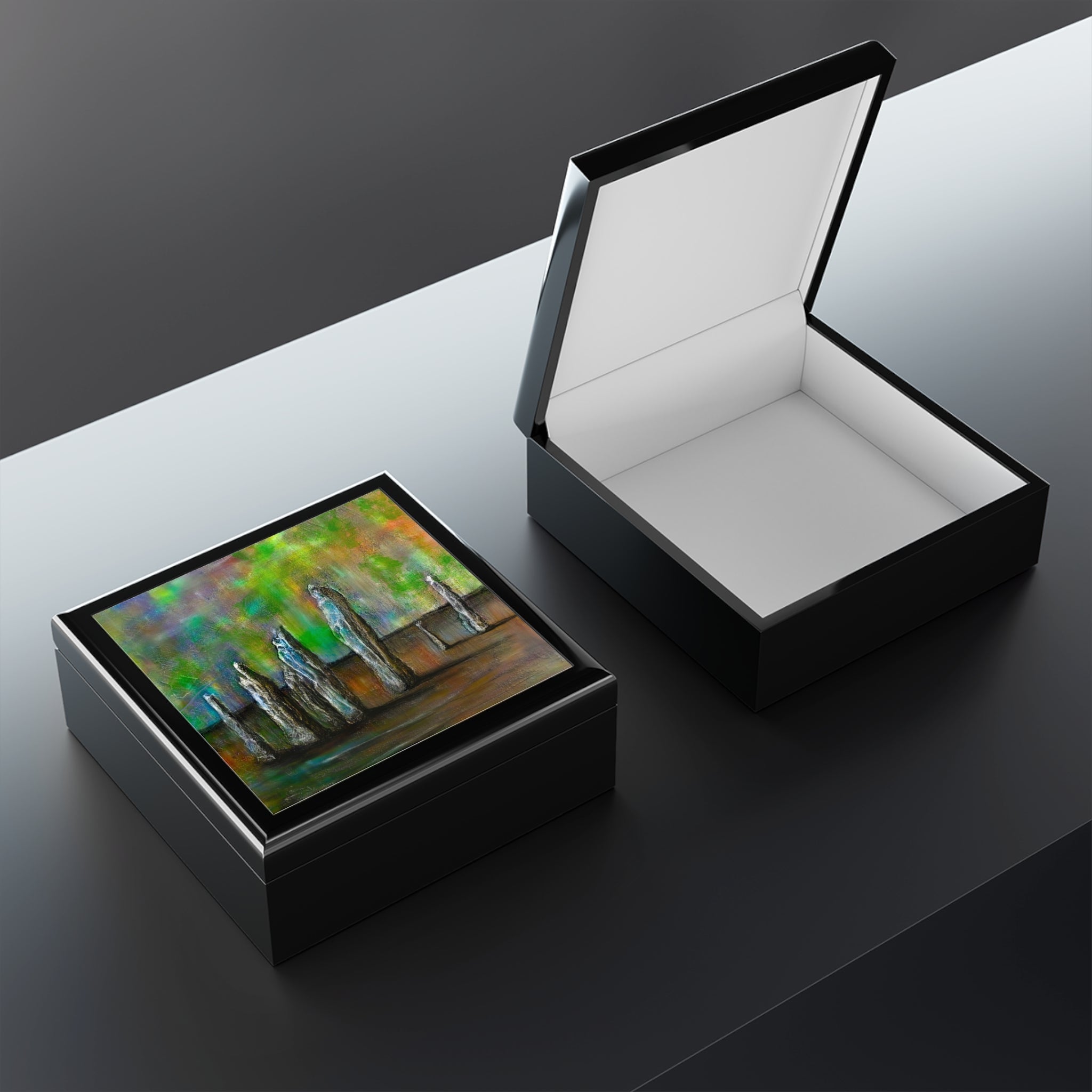 Black keepsake boxes with abstract art lid and white interior for Callanish Northern Lights jewelry storage