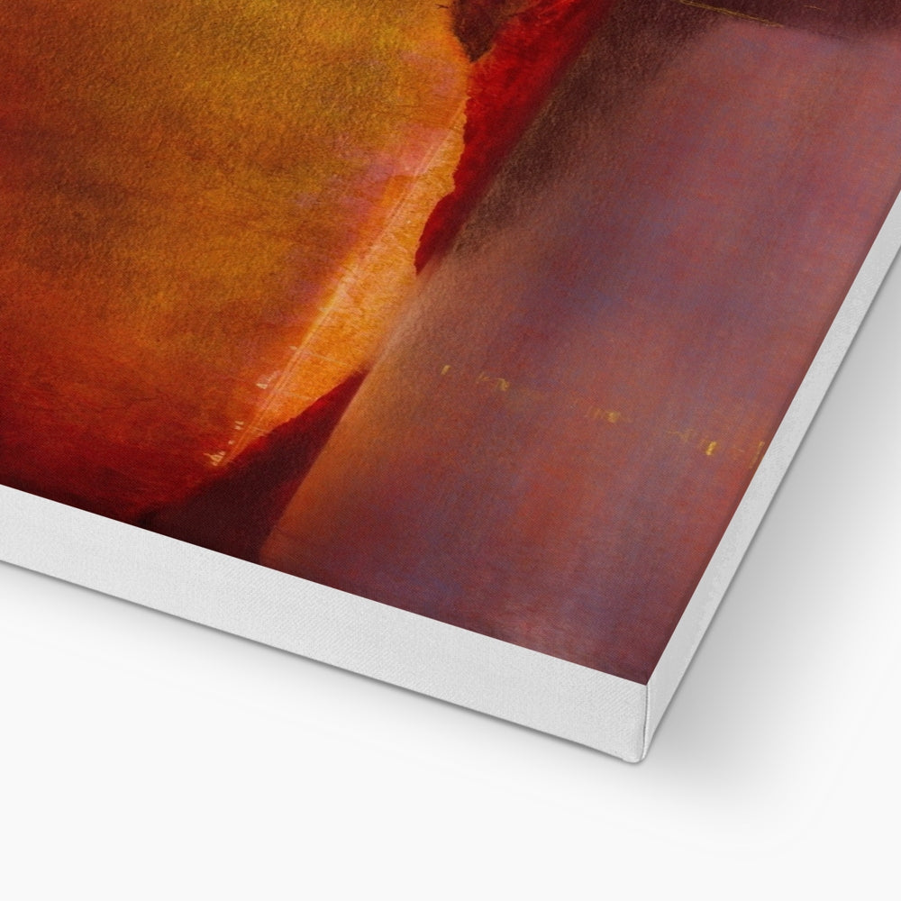 A vibrant, abstract canvas print with rich orange, red, and purple hues.