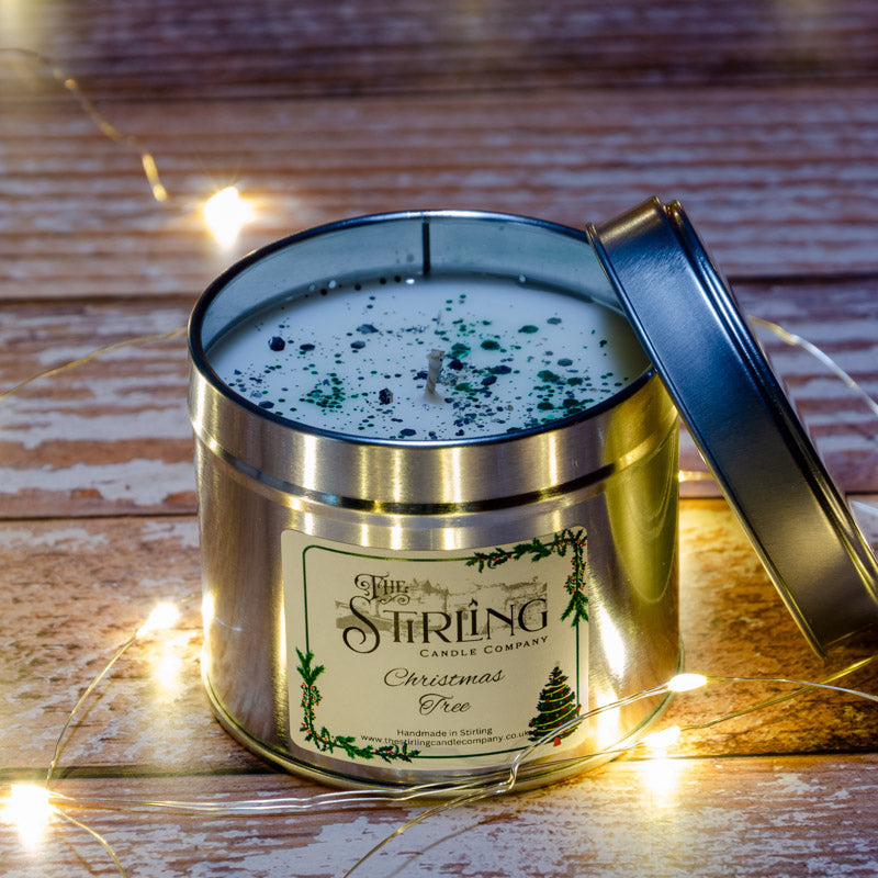 Christmas Tree travel tin candle with glitter-speckled white wax