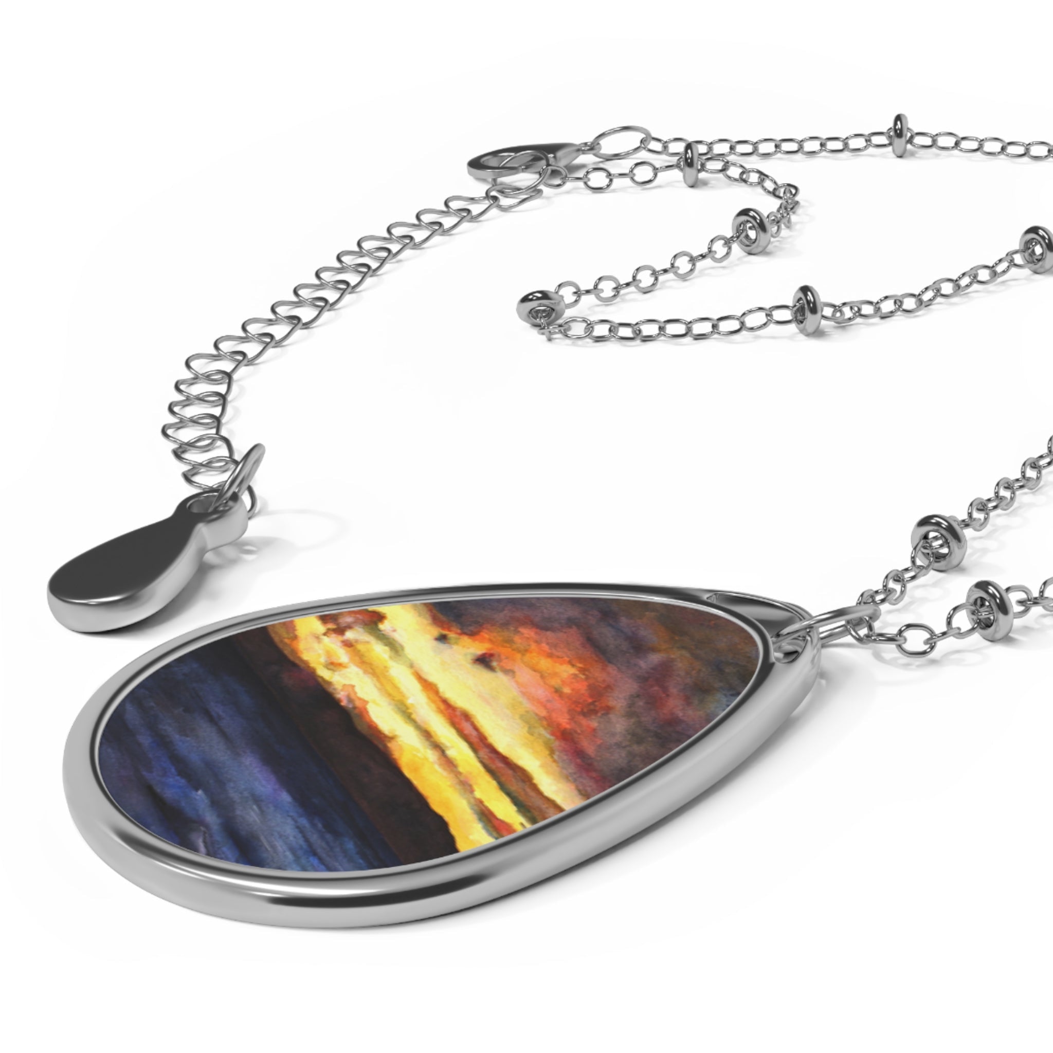 Silver teardrop pendant necklace with abstract art insert from Clyde Sunset Scottish Jewellery