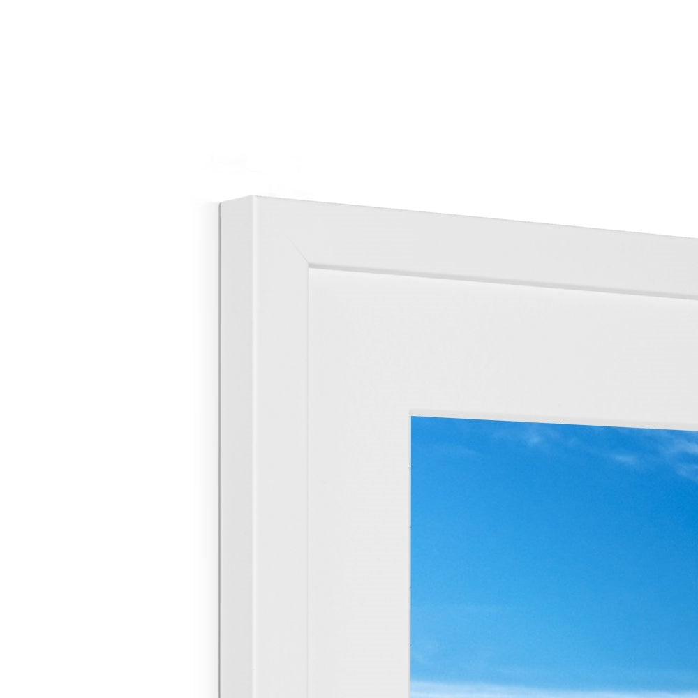 White Crocodile Rock Millport photo frame with blue sky clouds