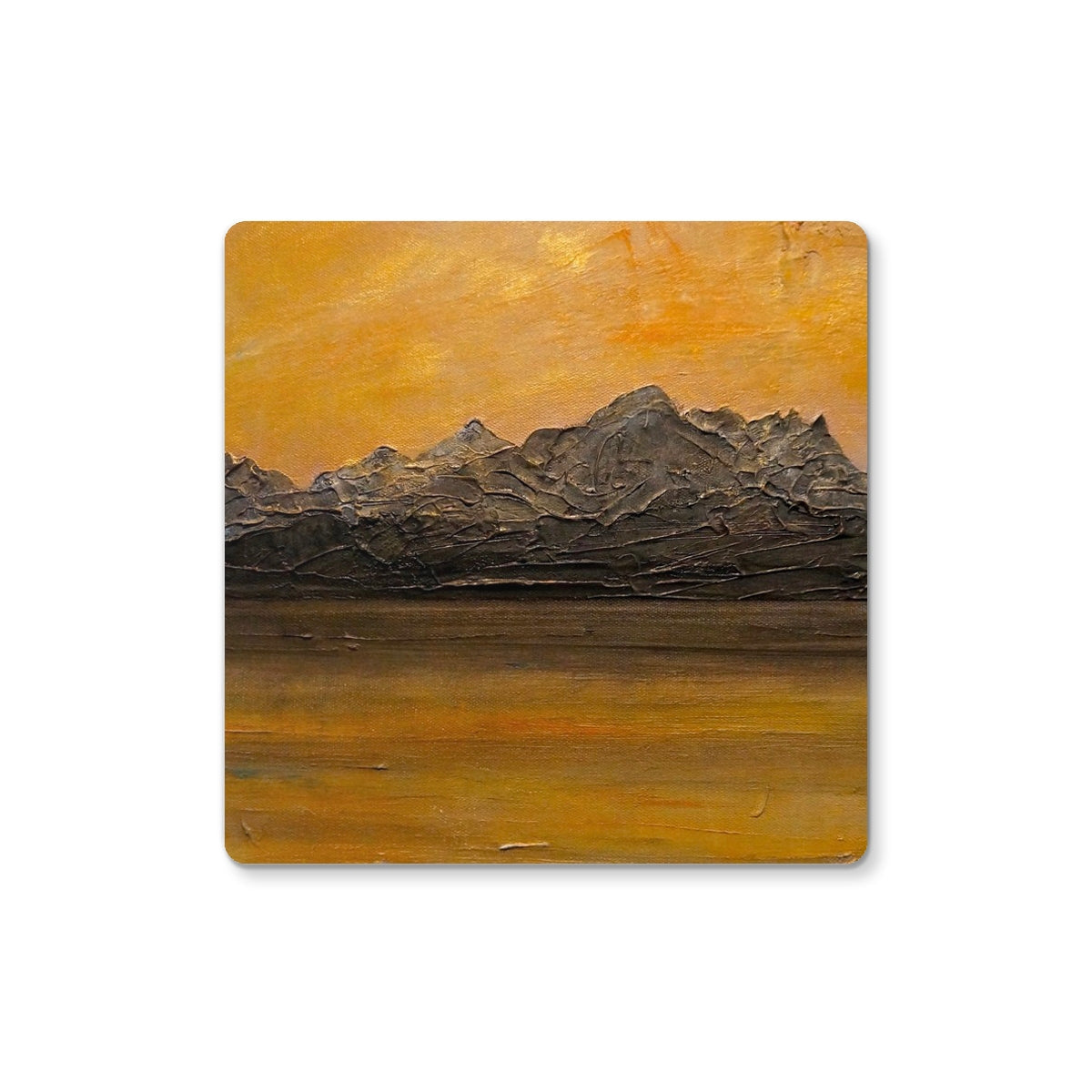 Textured dark gray Cuillin mountain range under orange sunset sky coaster
