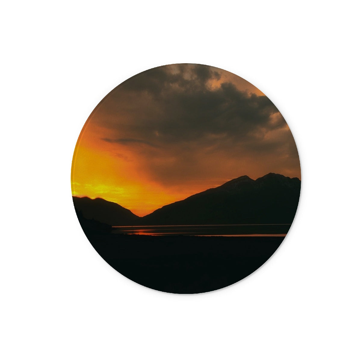 Orange sunset coaster with mountain silhouette on Deep Loch Leven board