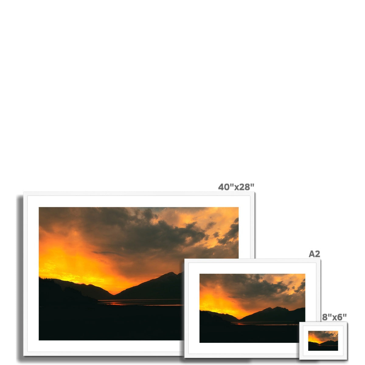 Framed 40x28 Deep Loch Leven sunset print with orange hues and mountain silhouette