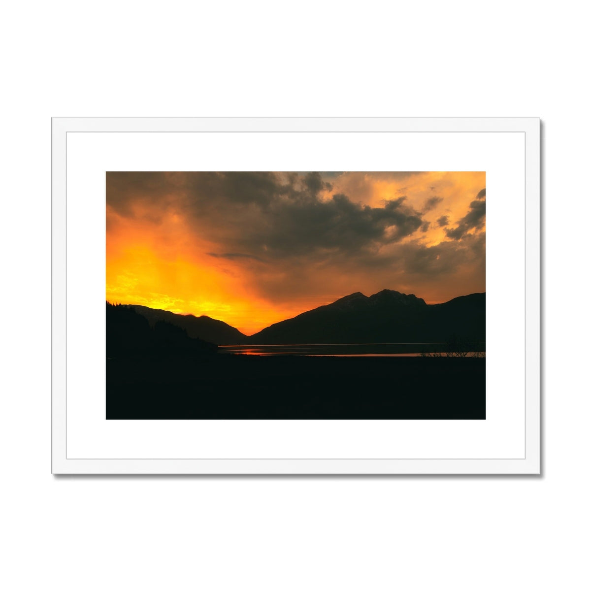 Deep Loch Leven sunset print with orange hues and silhouetted mountains