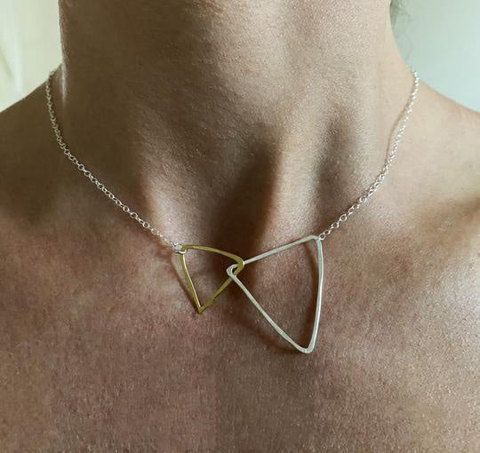 Double Triangle Necklace with gold and silver interlocking pendants