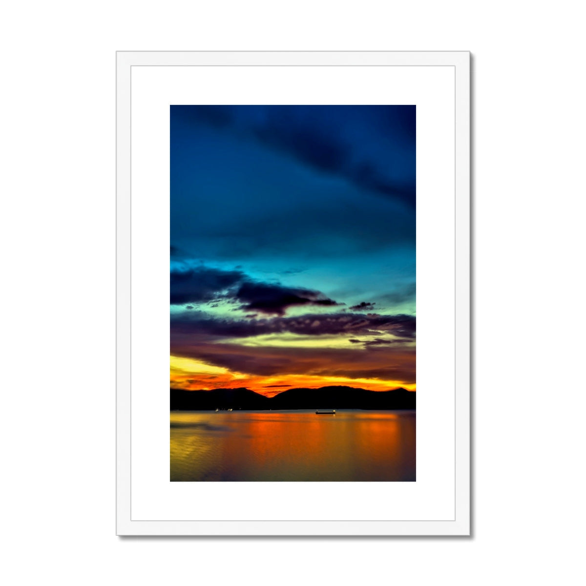 White framed Dreaming Of Sunset print with orange blue hues