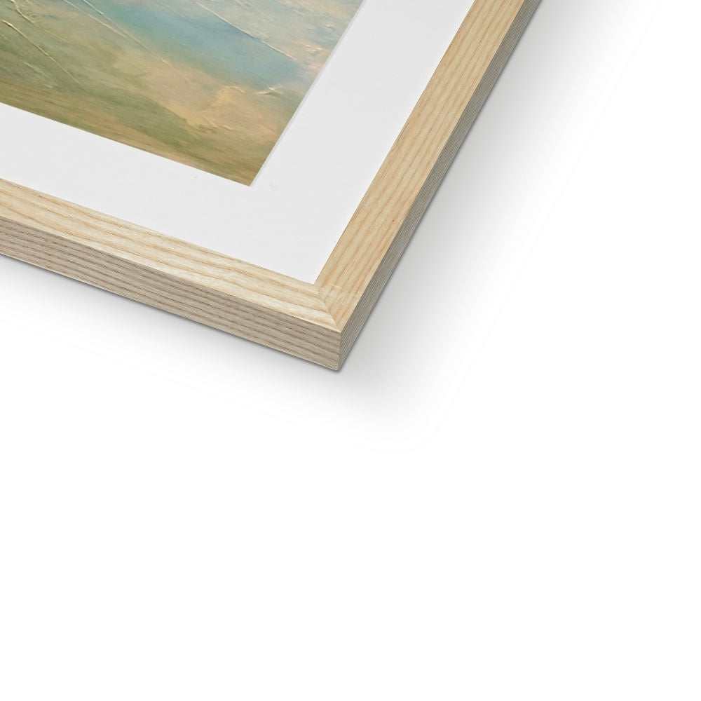 Light wood frame with white mat displaying abstract blue, green, and beige tones art