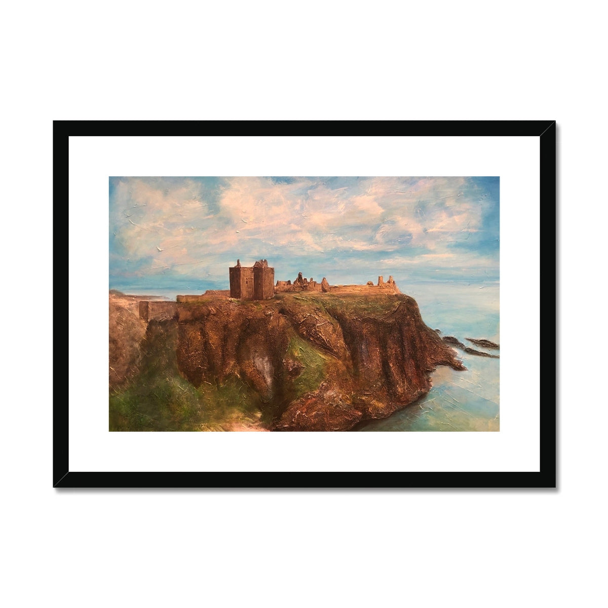 Framed Dunnottar Castle print depicting a cliffside castle overlooking the sea